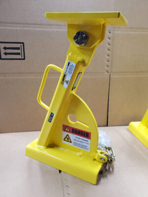 A Bright Yellow Stand Equipped With a Lock, Symbolizing Security and Protection for Displayed Items.