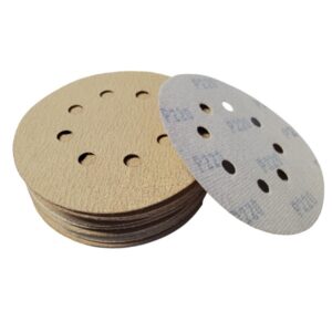 Close-up of a stack of sanding discs, Showcasing Their Design and Functionality.