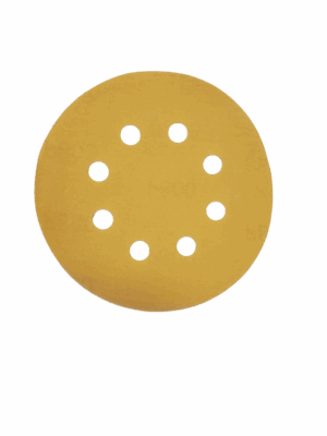 Close-up of a single velcro type sanding disc, with holes for dust collection